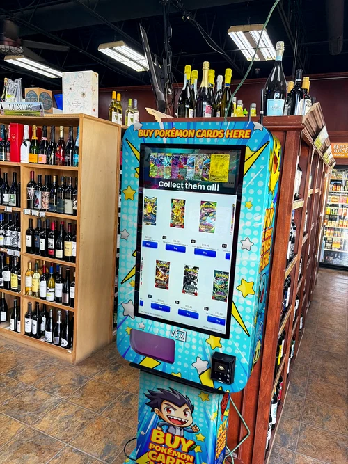 Trading card vending kiosk in a retail aisle